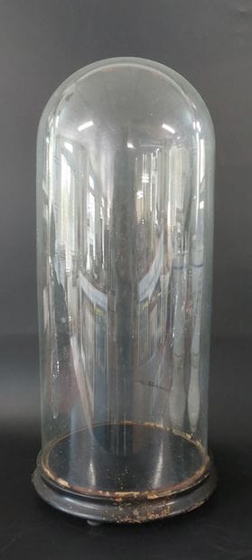 Glass GLOBE with a blackened wooden base...