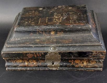 Blackened wooden box decorated with flowers...