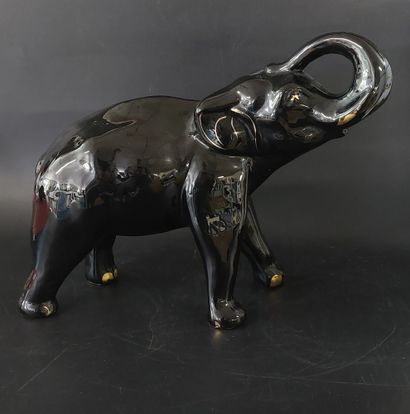 ELEPHANT, black and gold ceramic

H: 28 cm...