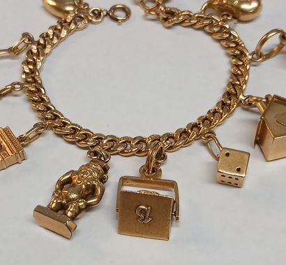 BRACELET à breloques en or 18K et pierres...