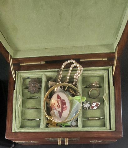 Blackened wooden box decorated with peacocks...