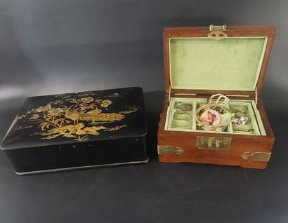 Blackened wooden box decorated with peacocks...