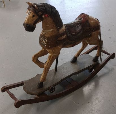 Wooden rocking horse, glass eyes, horsehair...