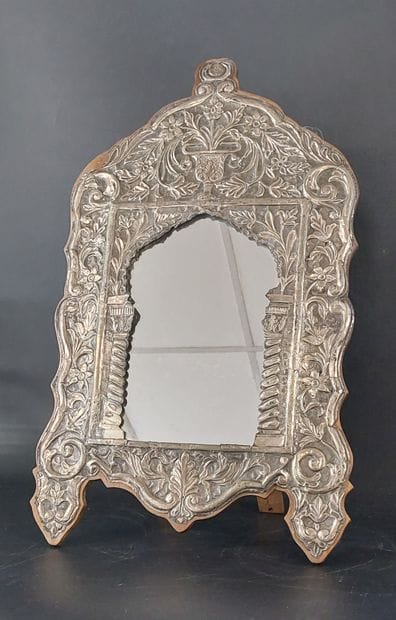 TABLE MIRROR decorated with a repoussé silver...