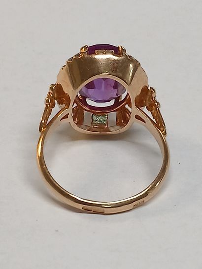 BAGUE en or 14K et pierre de couleur améthyste

T...