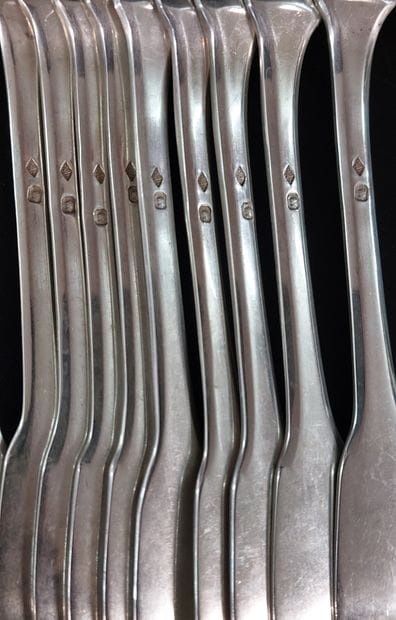 ELEVEN silver fish cutlery pieces

Minerva...