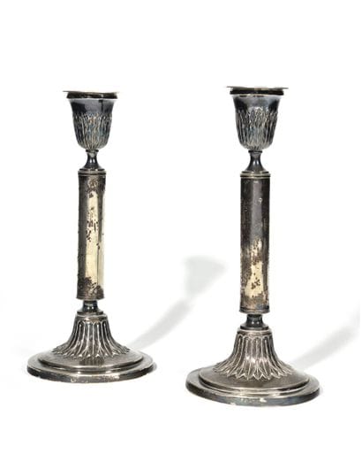 PAIR OF CANDLESTICKS. 
Silver with chased...