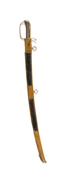 Sabre d’officier de hussard.
Monture en bronze.
Poignée...