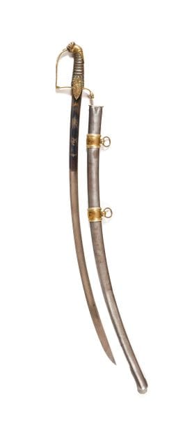 Sabre d’officier de cavalerie légère.
Monture...