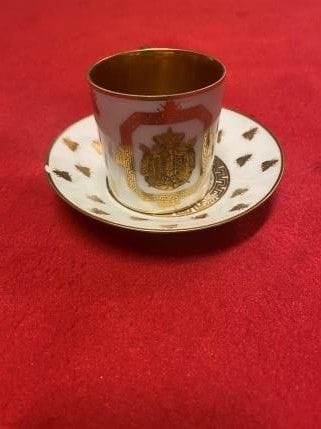 Cup and saucer featuring the large imperial...