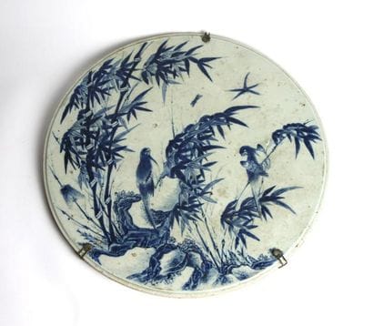 CHINE
Plaque ronde en porcelaine émaillé...