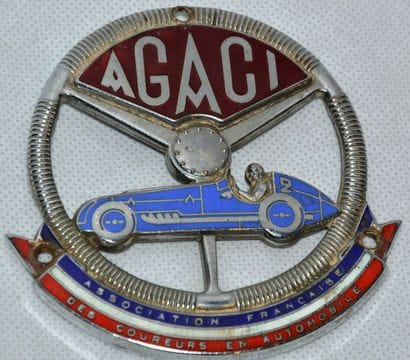 “A.G.A.C.I”
Badge automobile de l’A.G.A.C.I...