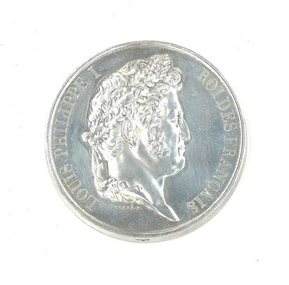 Médaille ronde en argent. Avers : « Louis...