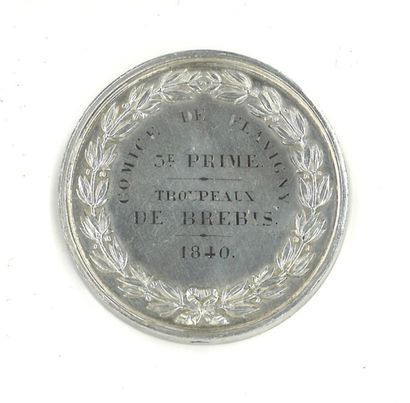 Médaille ronde en argent. Avers : « Louis...