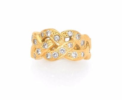 IMPORTANTE BAGUE en or jaune, la monture...