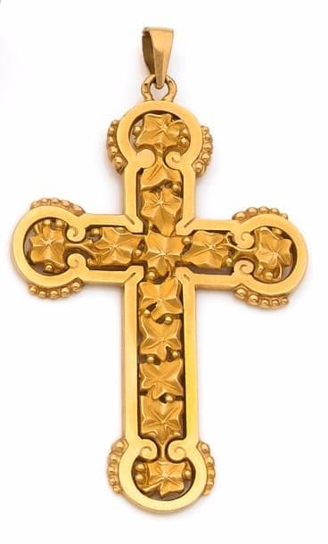 PENDENTIF stylisant une croix ornée d’un...