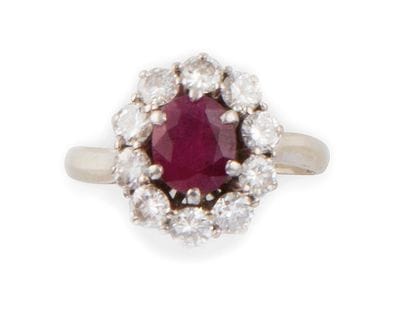 BAGUE MARGUERITE
en platine, retenant un...