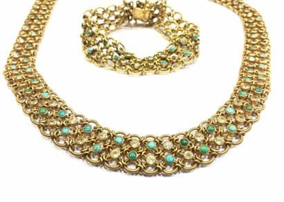 PARURE en or jaune, comprenant un bracelet...