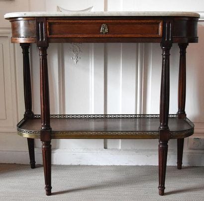 CONSOLE demi-lune en placage d'acajou ouvrant...