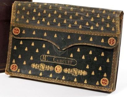 Portefeuille à soufflets de M.CAHOUET. En...