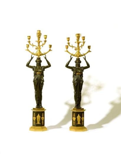 Paire de candélabres en bronze à patine brune...