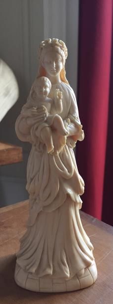 VIERGE A L'ENFANT en ivoire sculpté XIXème...