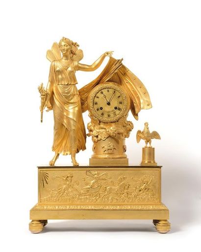 PENDULE en bronze ciselé et doré figurant...