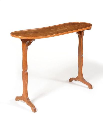 Table de forme rognon en acajou et placage...