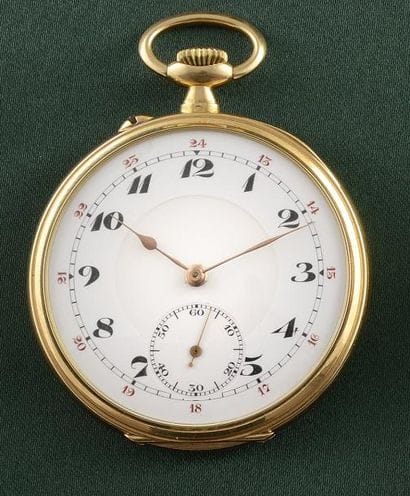 MONTRE DE POCHE

Boîtier rond en or jaune...