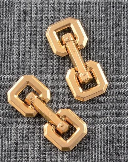 PAIRE DE BOUTONS

DE MANCHETTES

en or jaune...