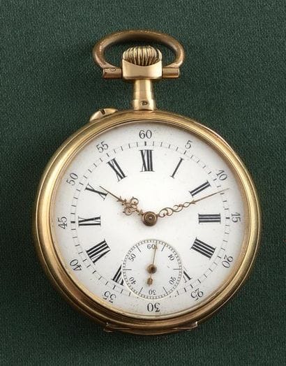 MONTRE DE POCHE

Boîtier rond en or jaune...