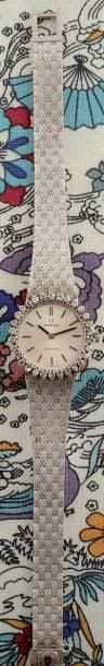 OMEGA

vers 1960

Montre de dame

en or blanc...