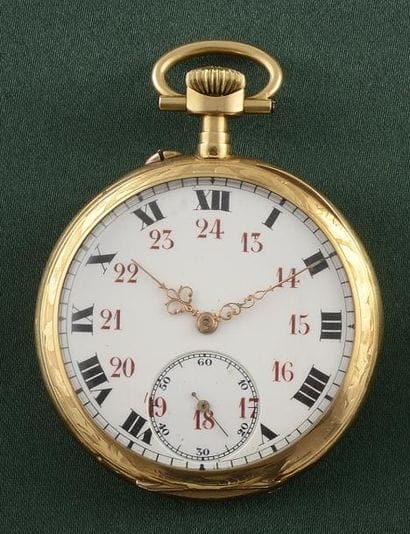 MONTRE DE POCHE

Boîtier rond en or jaune...