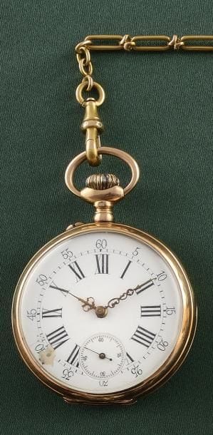 MONTRE DE POCHE

Boîtier rond en or jaune...