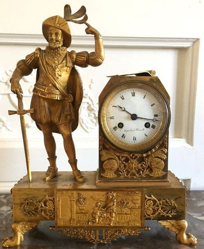 PENDULE en bronze doré représentant le roi...