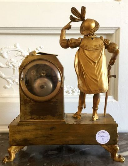 PENDULE en bronze doré représentant le roi...