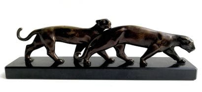 LUC (XXe) « Deux panthères marchant » Bronze...