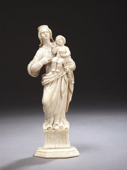 Virgin and Child in ivory carved in the round,...