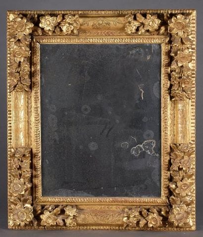 Rectangular mirror, the carved and gilded...