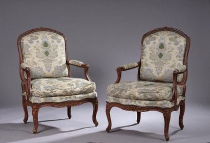 Pair of flat-backed armchairs in patinated...