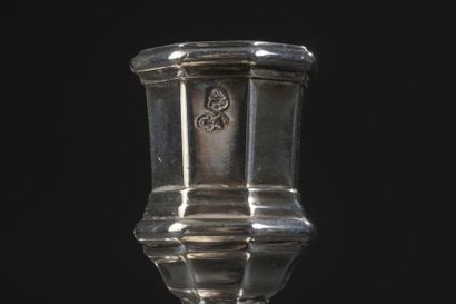 Pair of silver torches with cut-off sides,...