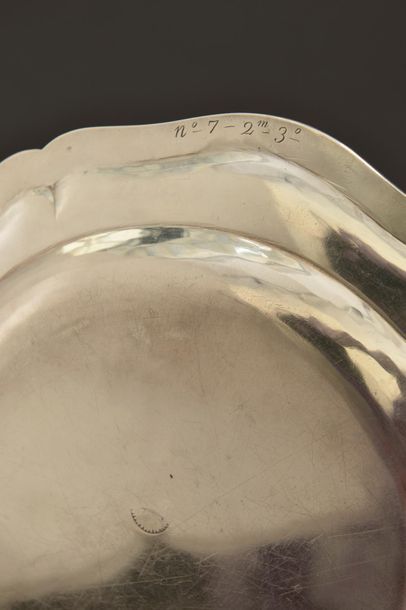 Circular silver platter with five contours...