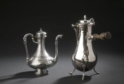 Silver baluster chocolate maker resting on...