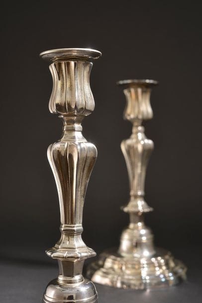 Pair of silver plated bronze torches, the...