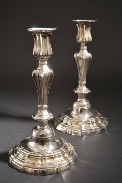 Pair of silver plated bronze torches, the...