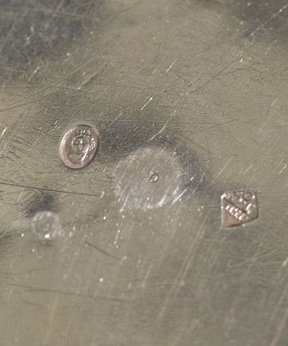 Silver covered vegetable dish edged with...