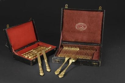 Twelve gilded metal cutlery with entremets,...