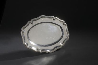 Silver oval dish with eight wrapped contours,...
