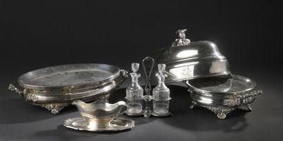Set in silvery metal comprising: 
- A circular...