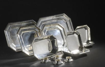 Set of serving dishes with cut-off sides,...
